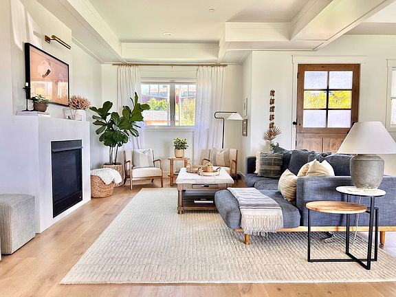 Living room has automatic blinds