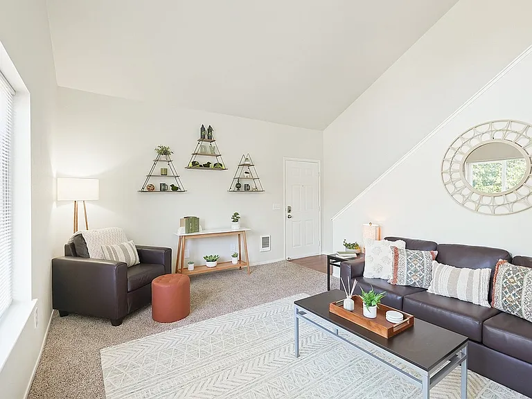 Step into a beautifully designed living room that offers both comfort and style.