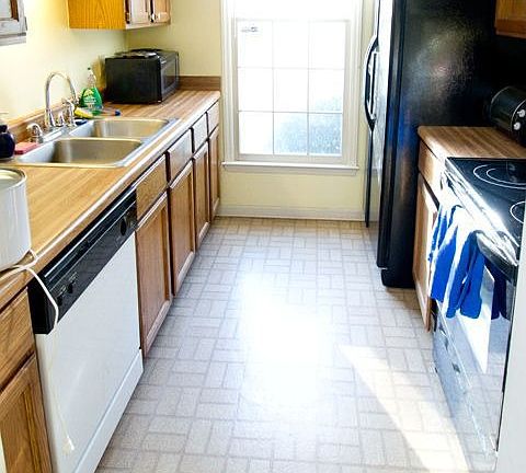 kitchen with new stove and fridge