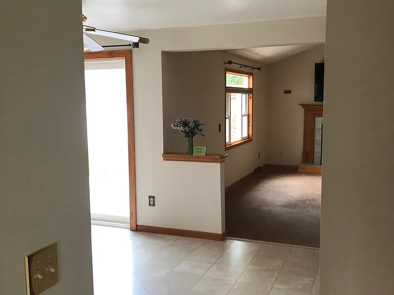 Eat in kitchen with access to garage as well as large stamped patio/fenced yard.
