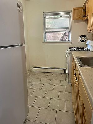 2nd image of 11950 Metropolitan Ave APT 9A
