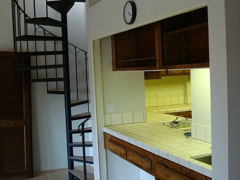 spiral staircase to loft on 3rd floor