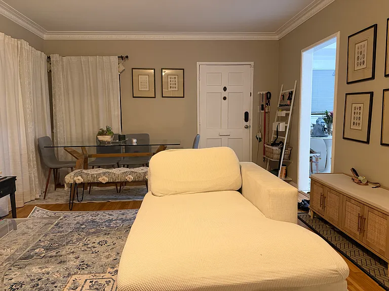 Current tenant _ living room to front door (after furniture update)