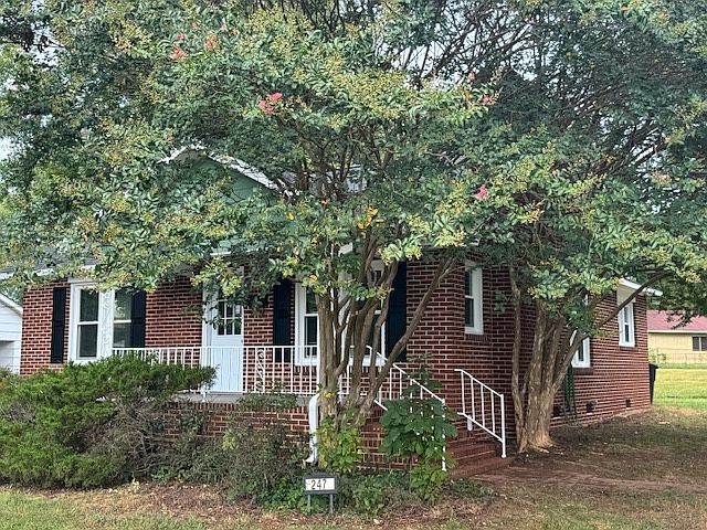 Adorable brick bungalow with fantastic front porch