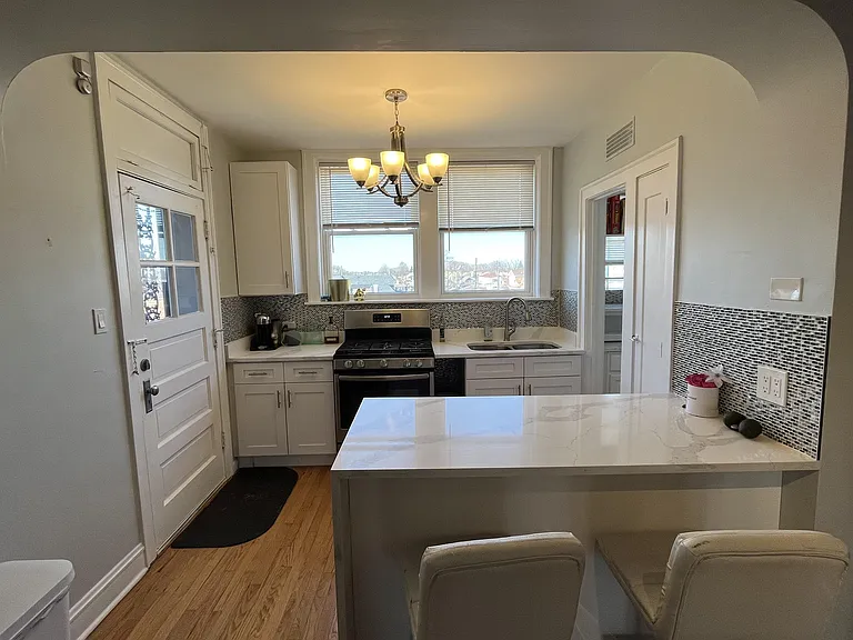Beautiful quartz countertops and new cabinets with big windows make this perfect for entertaining.