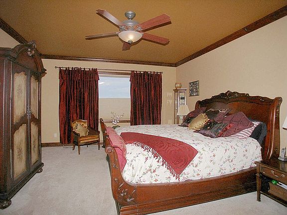 More outstanding Peak views from master bedroom with marble fireplace