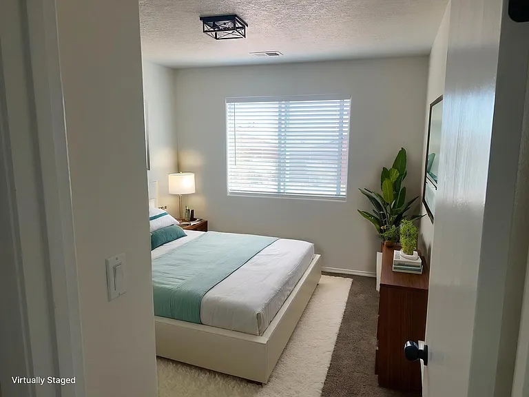 Virtually staged second bedroom. Furnishings not included.