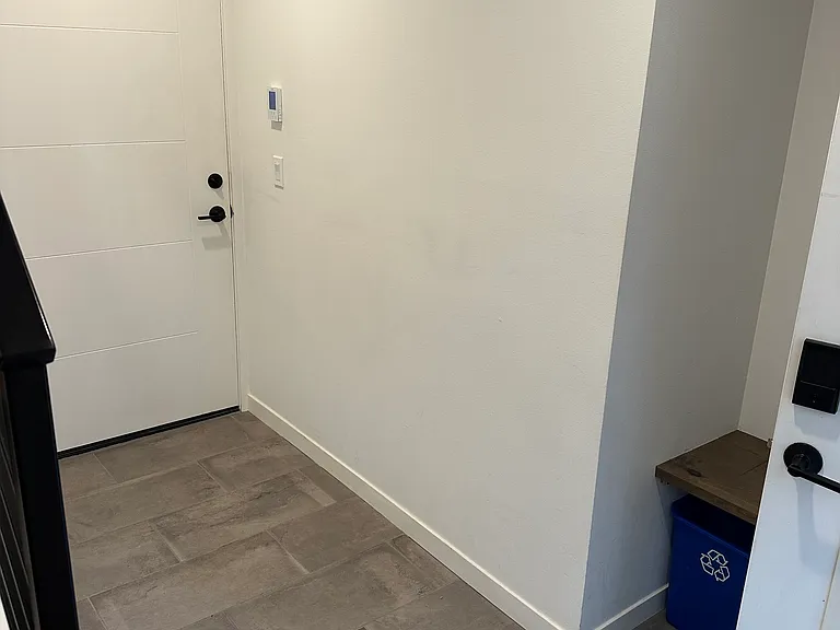Programmable fan forced heater in entry.