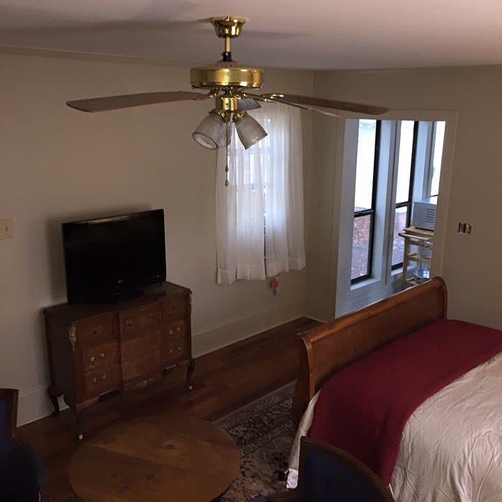 main room with ceiling fan