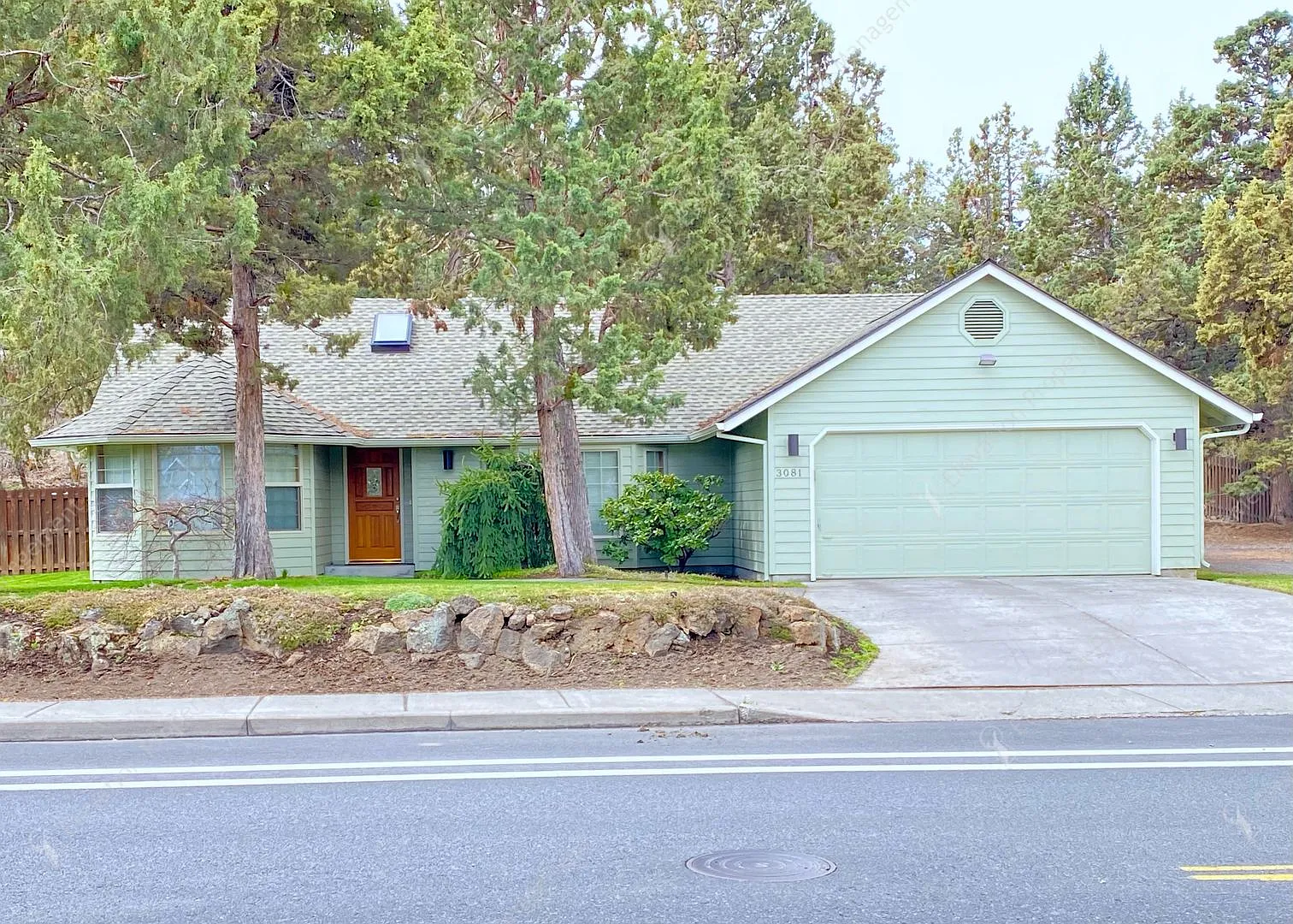 Charming Ranch-Style Home with Lush Landscaping and Ideal NE Location — Photo 1