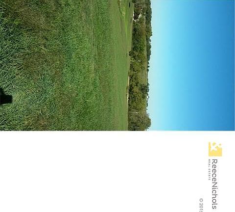 NW view overlooking countryside from hill.