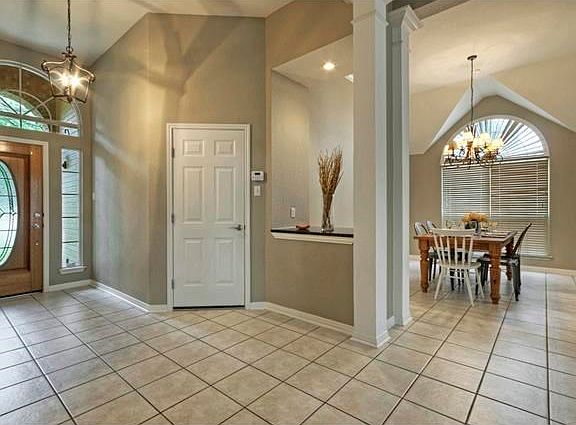 Entryway with formal dining to right