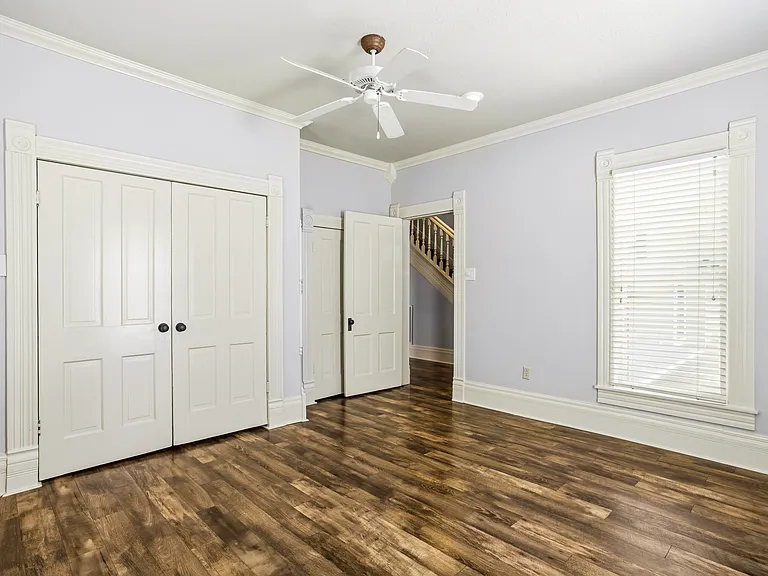 1st Floor Bedroom. Utility Closet behind French Doors
