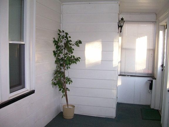 enclosed front porch