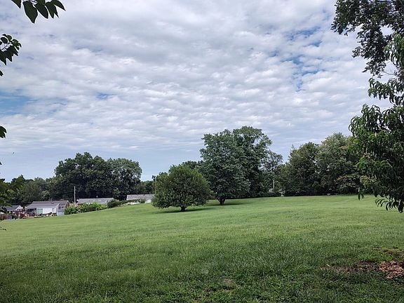 View of Open Field behind several acres.