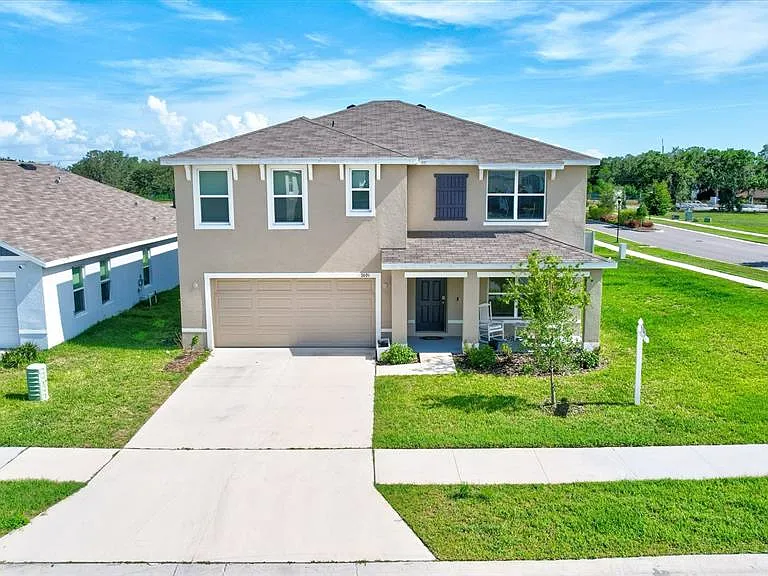 7601 Rosewood Garden Loop — Photo 1