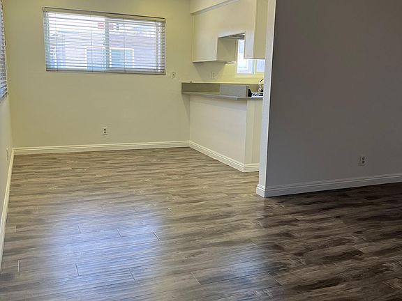Living room and dining room, vinyl planks throughout