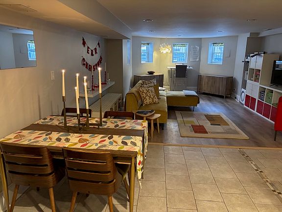 Dining area in open floor plan including kitchen, dining and living rooms.