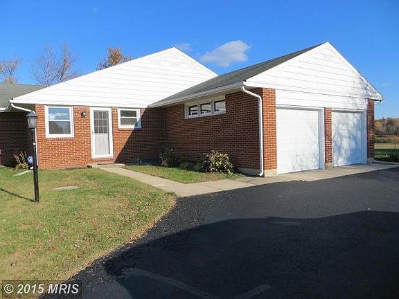 EXTERIOR SIDE WITH 2 CAR GARAGE