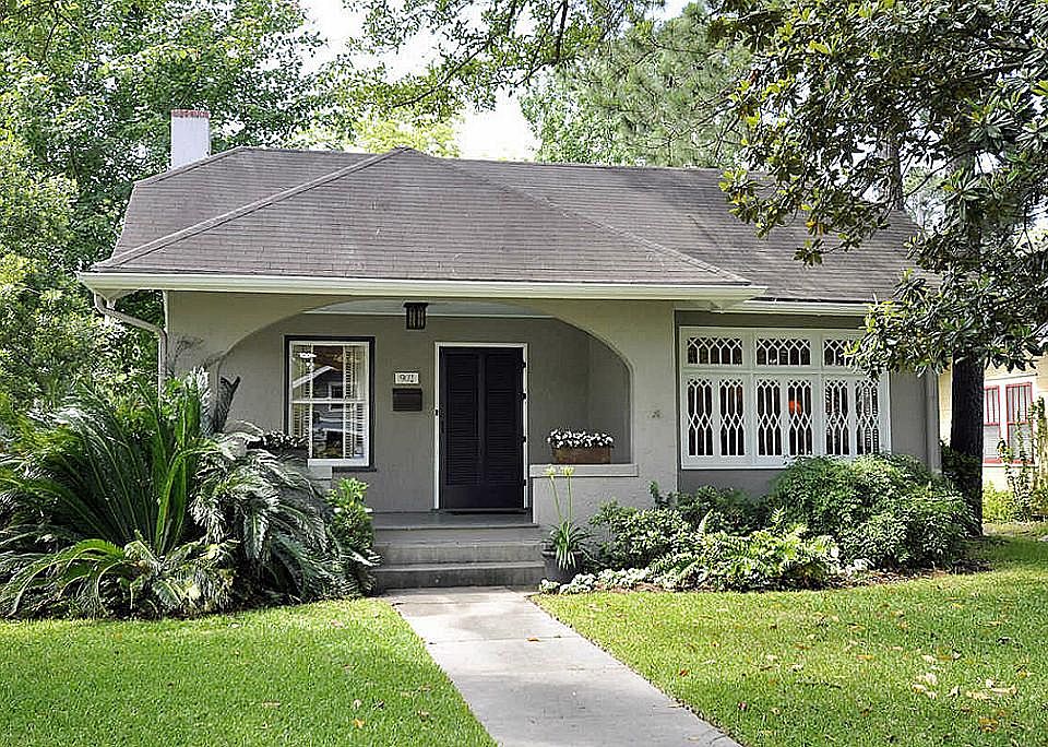 1920's English Cottage Arts and Crafts style updated to retain original charm. The best of the Heigh