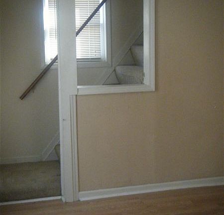 Living room facing stairs