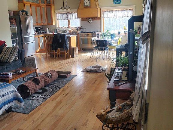 Living room opens to kitchen