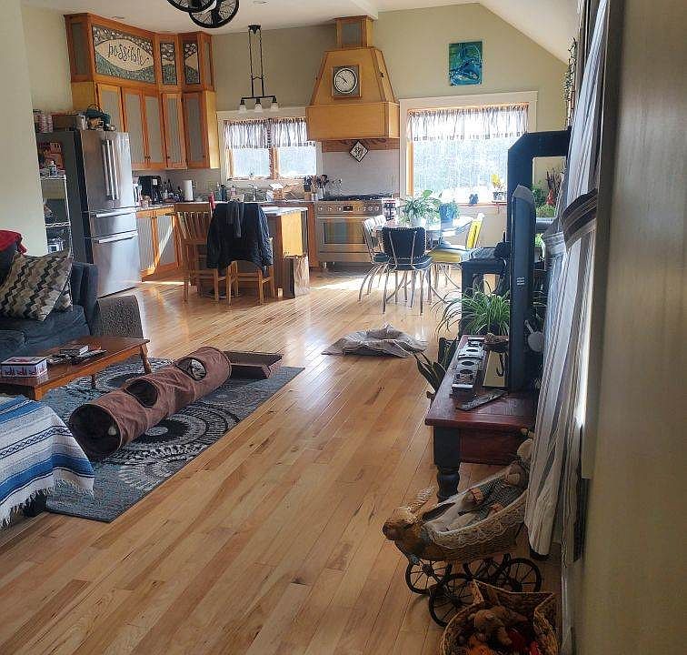 Living room opens to kitchen