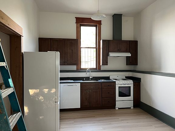 Kitchen /living (Blue ladder will be gone. Cleaners coming soon to do construction cleanup)