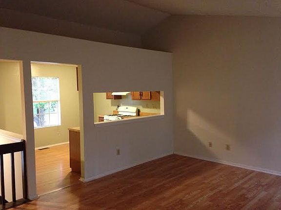 View of family room, which is open to the foyer and kitchen.