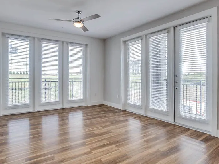 Living Room with Balcony and Hard Surface Flooring