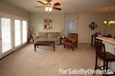 Living Room
						:
						Custom paint and plantation blinds throughout