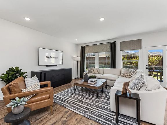 Great room with luxurious wood flooring