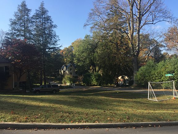 Large front/side yard.