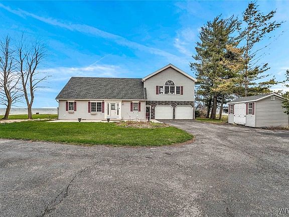 Set far back from the road with plenty of garage a