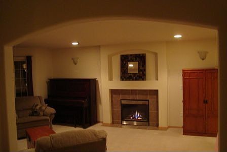Elegant archways, cozy fireplace