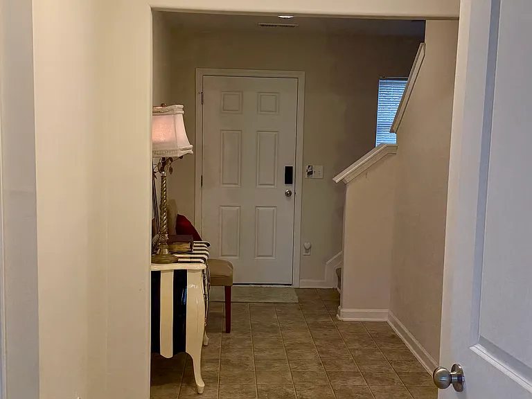 Front entry, Upstairs to Bedrooms and bonus room. Entry leads to Living room and Kitchen, 1.2 bath on first floor with Closet storage and Pantry.