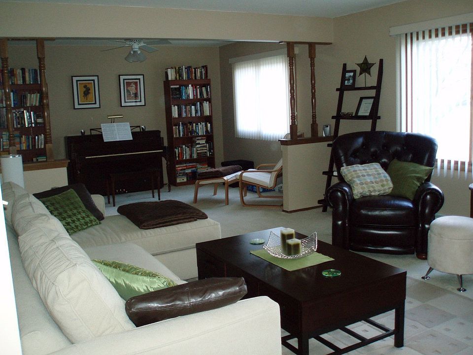 Large, cozy living room with attached den/dining room