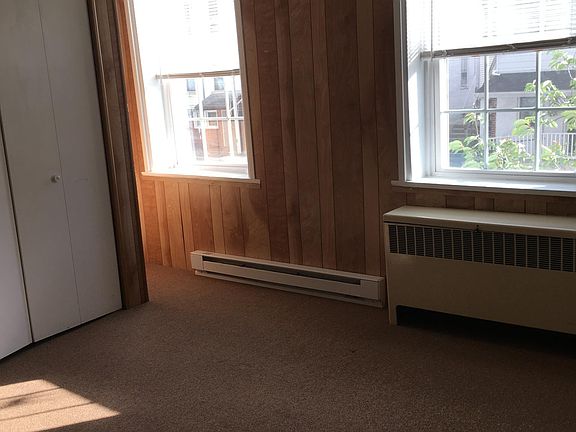 Front Bedroom - photo 2. Two windows look out on the front of home on Main Street