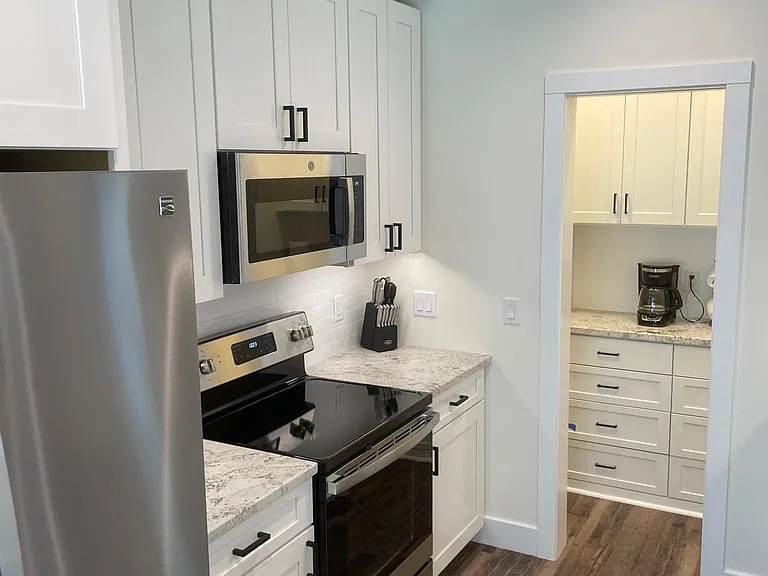 Full Service Upscale Modern Kitchen with a walk-in pantry
