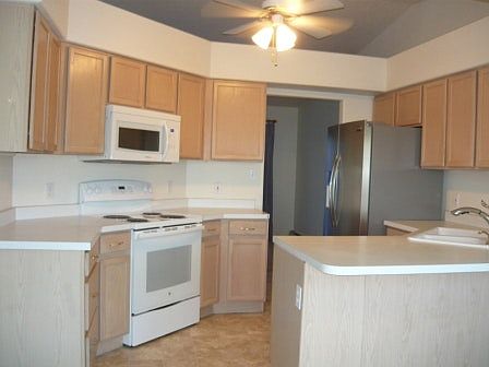 Bright kitchen with newer appliances.