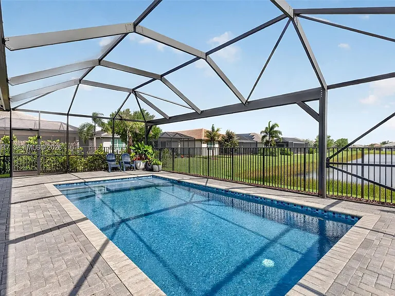 11996 SW Seahorse Springs Ter — Photo 57