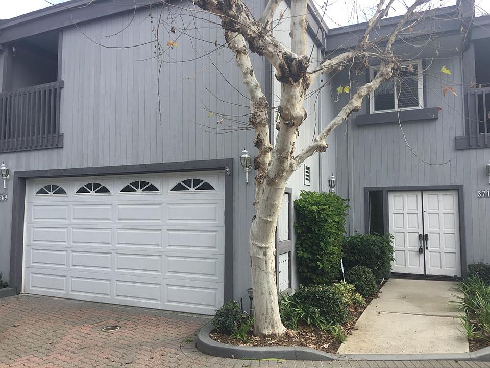 Front view of entry way and attached 2=car garage