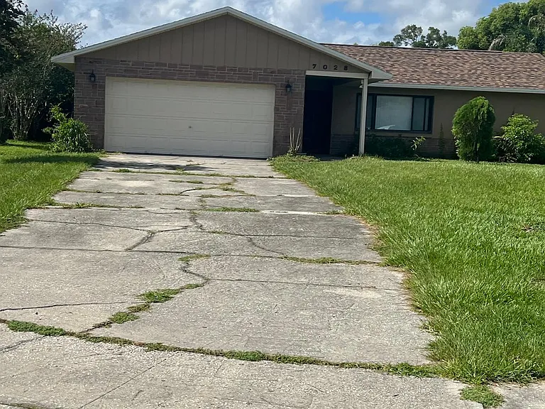7028 Hammock Way #7028 — Photo 1
