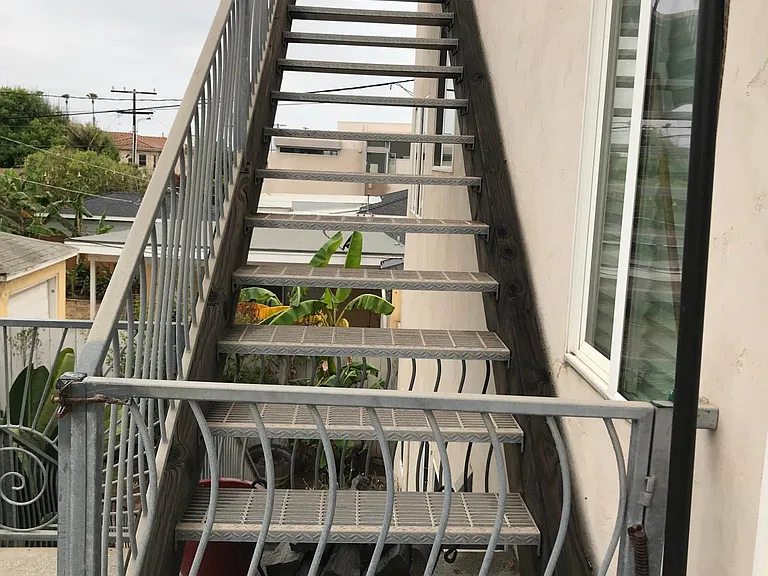 These stairs lead to a rooftop deck.