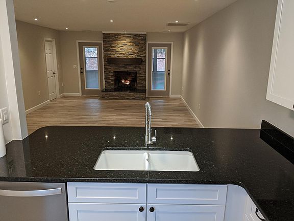 Kitchen bar top overlooking living area