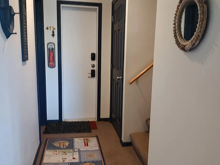 Downstairs Hall closer to Garage Door