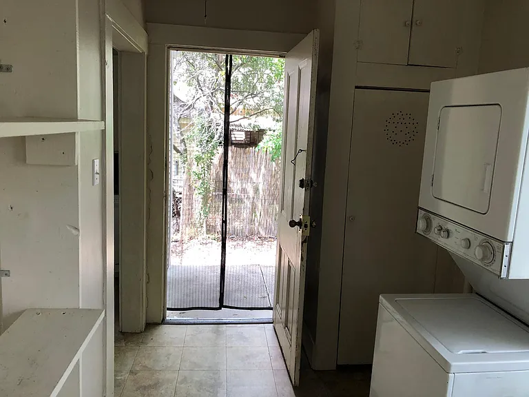 Back door to patio and backyard
