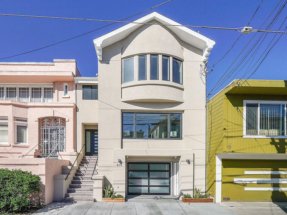 The 3 level single-family house with one car enclosed garage.