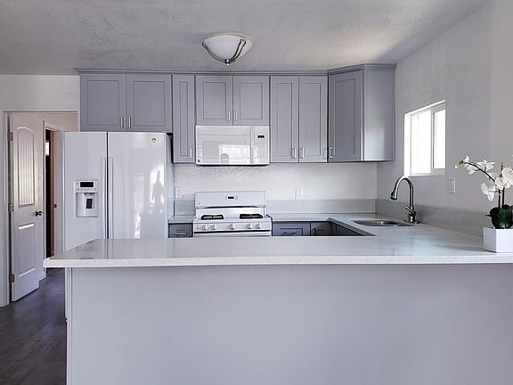 Refrigerator, Stove and Microwave Included!