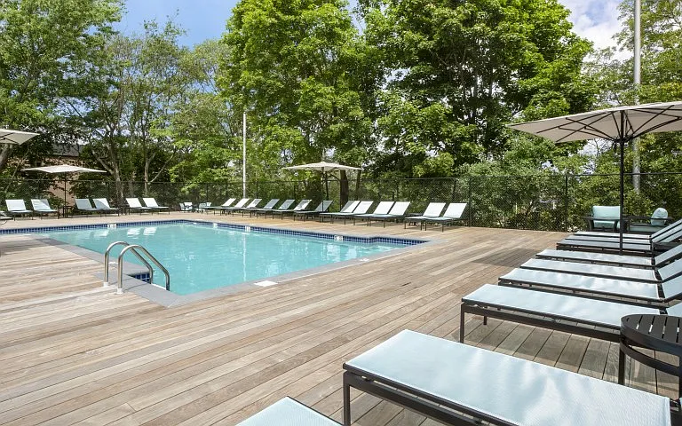 Sun-filled outdoor pool and lounge deck